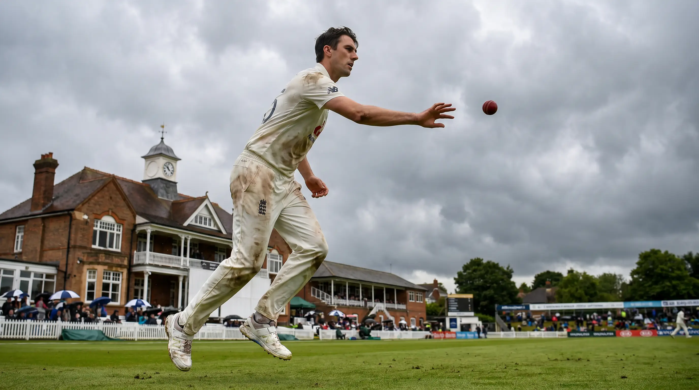 Fast bowler bowls under heavy cloud cover at an English Test ground