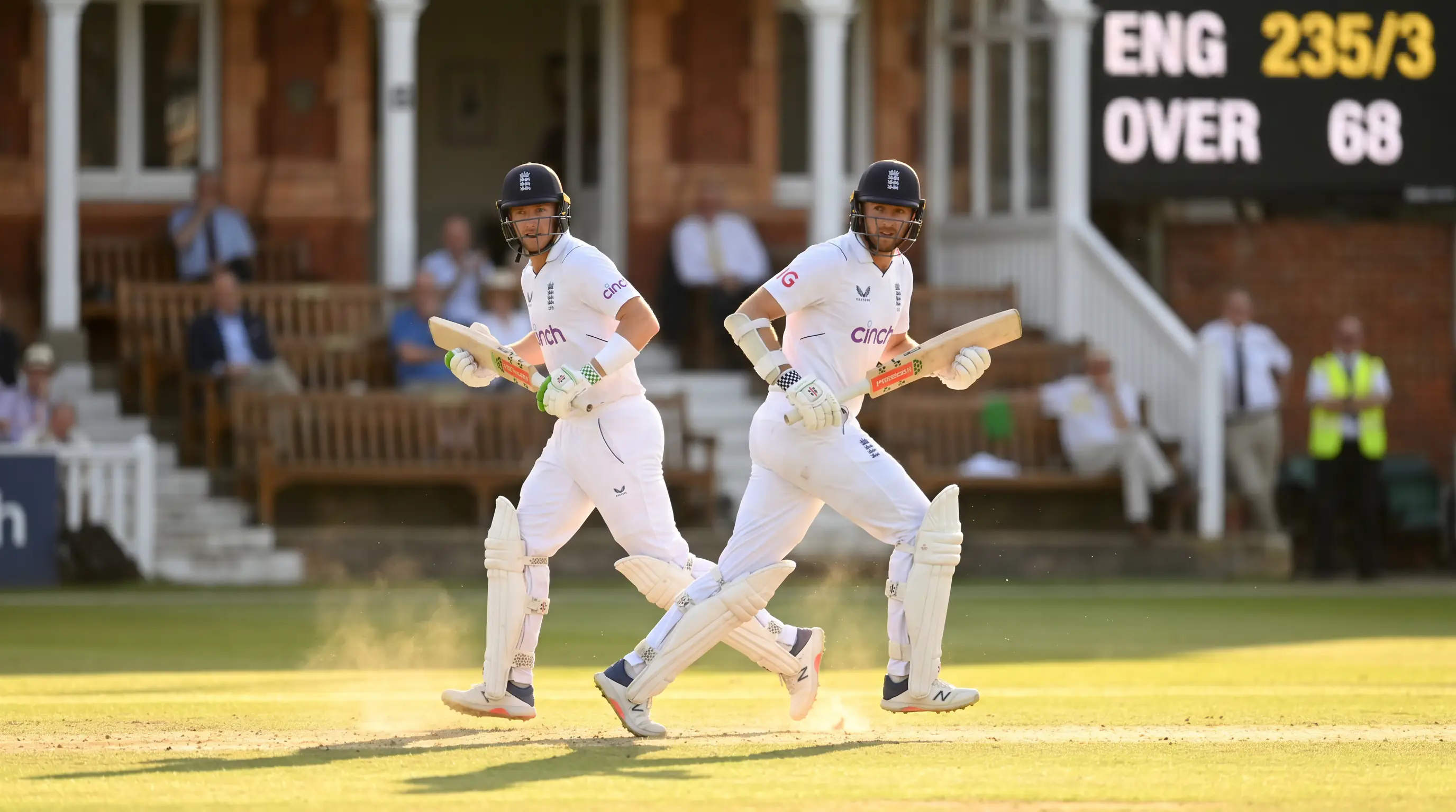 Two Test batters in whites accumulate runs during a fourth-day partnership